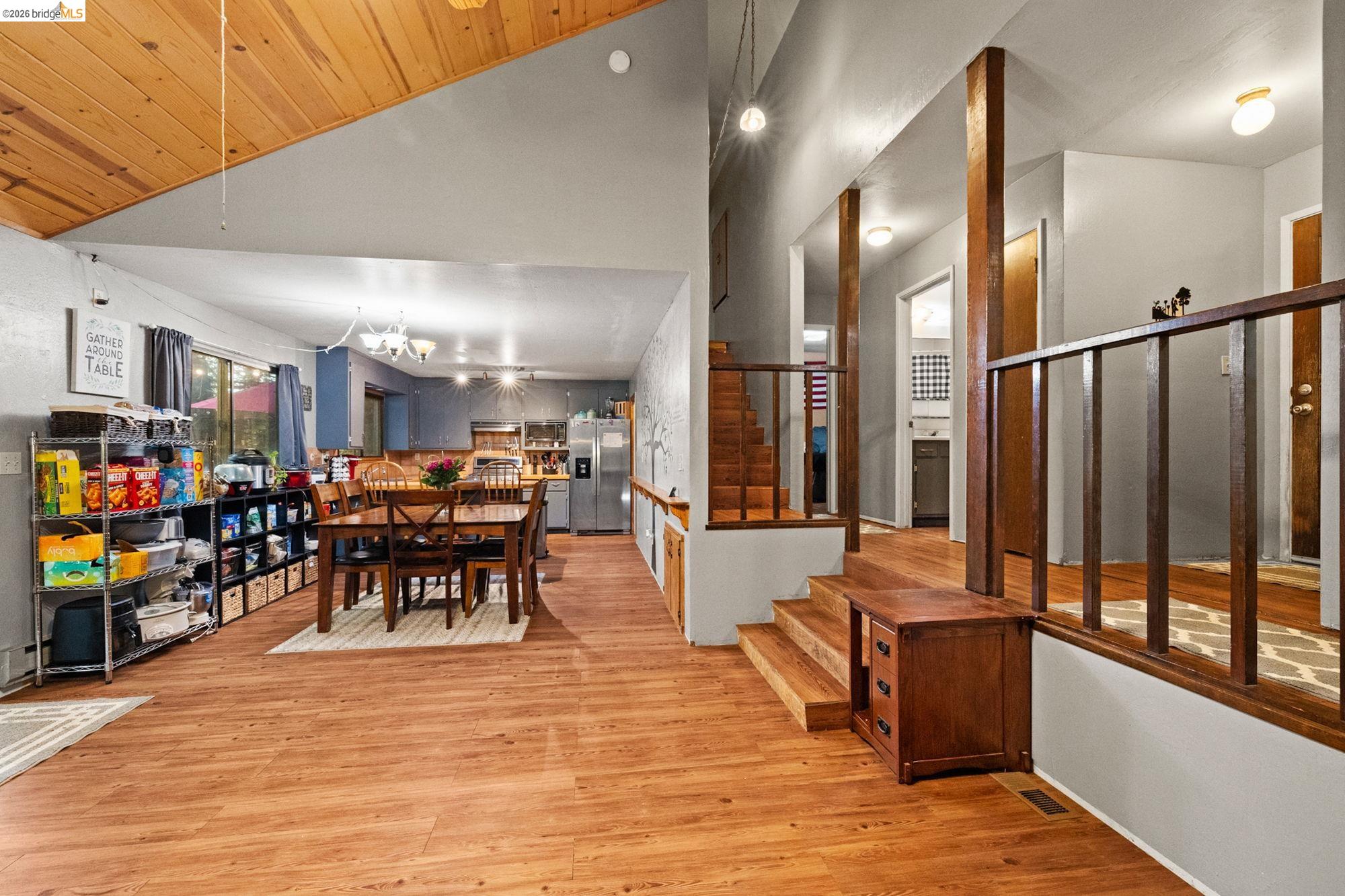 17851 Robin Road Twain Harte, CA 95383 - Photo 6 of 45 Dining room featuring light wood-type flooring, a chandelier, and a vaulted wooden ceiling