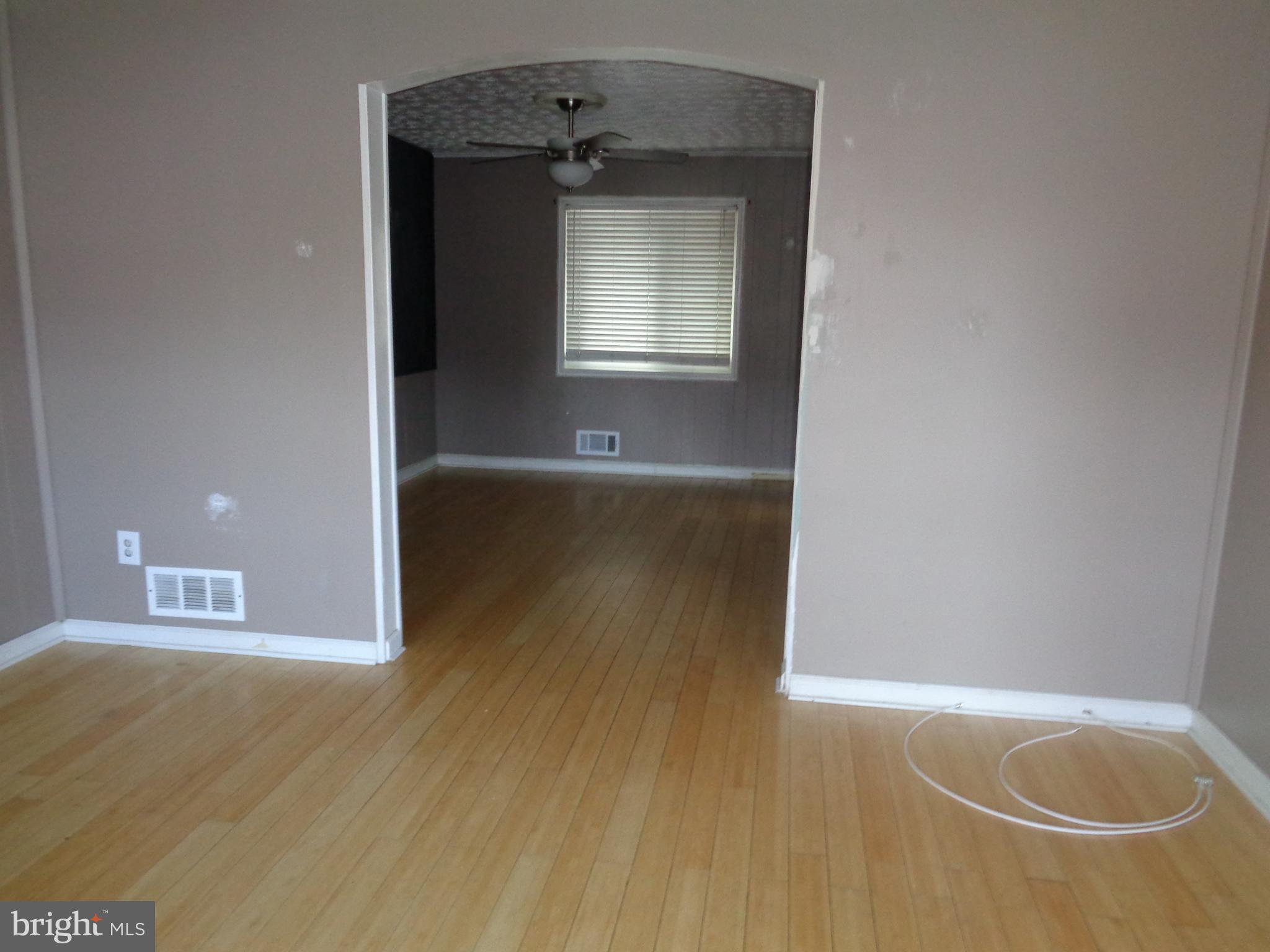 7816 Charlesmont Road Baltimore, MD 21222 - Photo 3 of 10 Living Room Dining Room