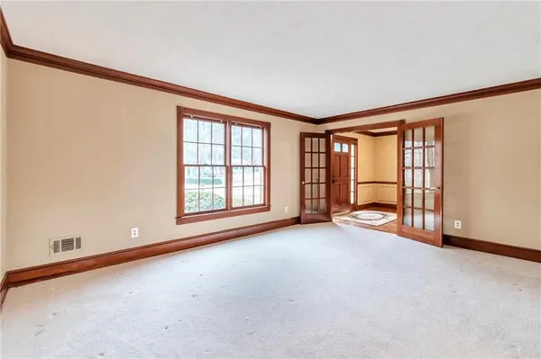 an empty room with windows