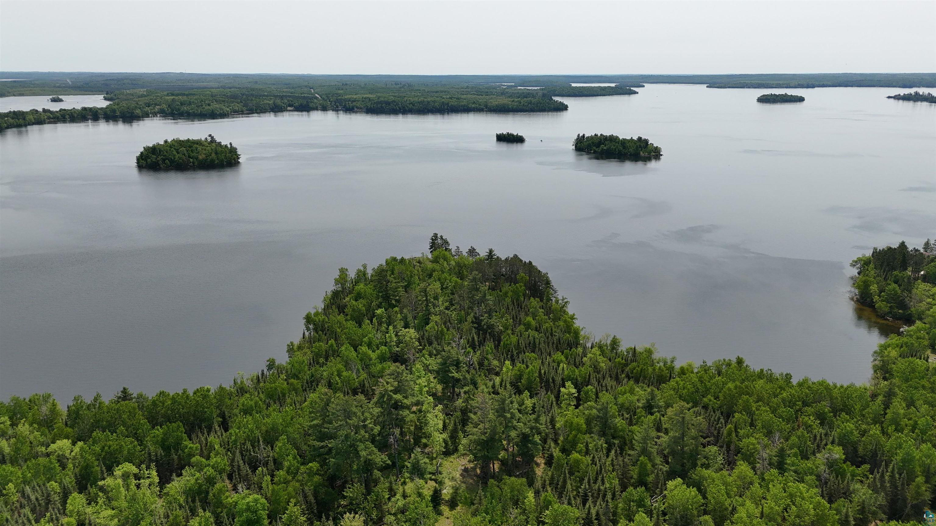 11.82 Bessette Road Orr, MN 55771 - Photo 5 of 44 Aerial view of a large body of water and a heavily wooded area