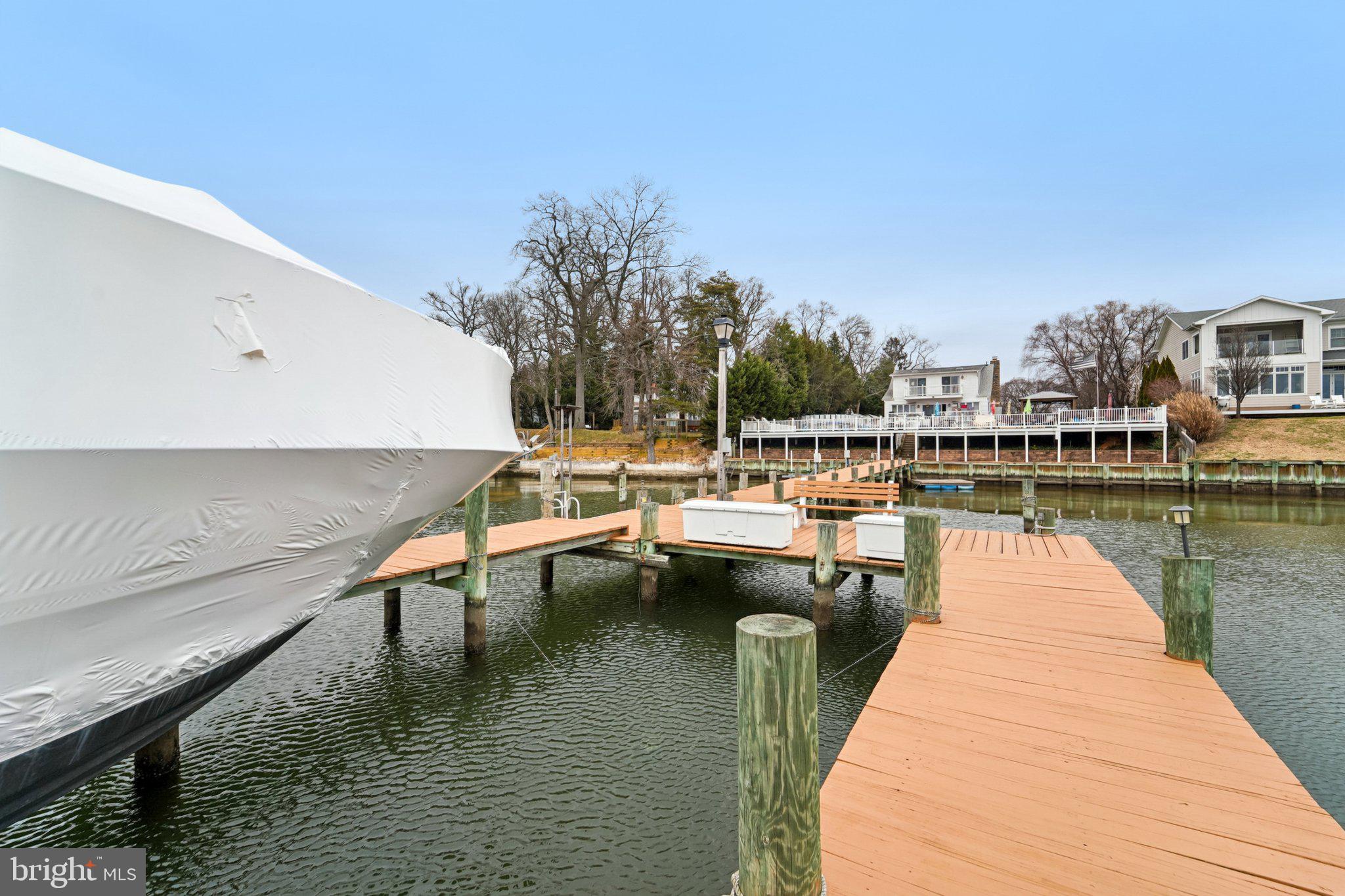 1507 Shore Road Baltimore, MD 21220 - Photo 12 of 46 a view of a lake with chairs