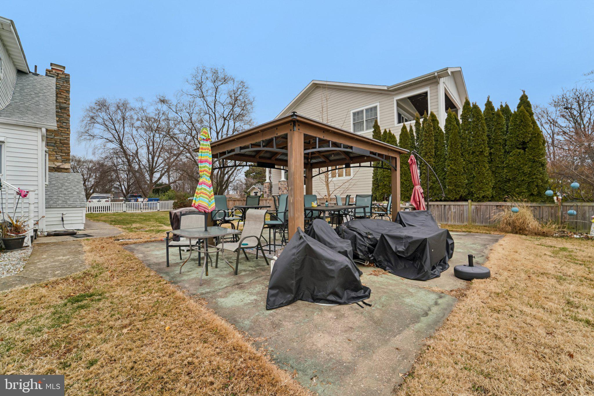 1507 Shore Road Baltimore, MD 21220 - Photo 17 of 46 a view of a house with backyard and sitting area
