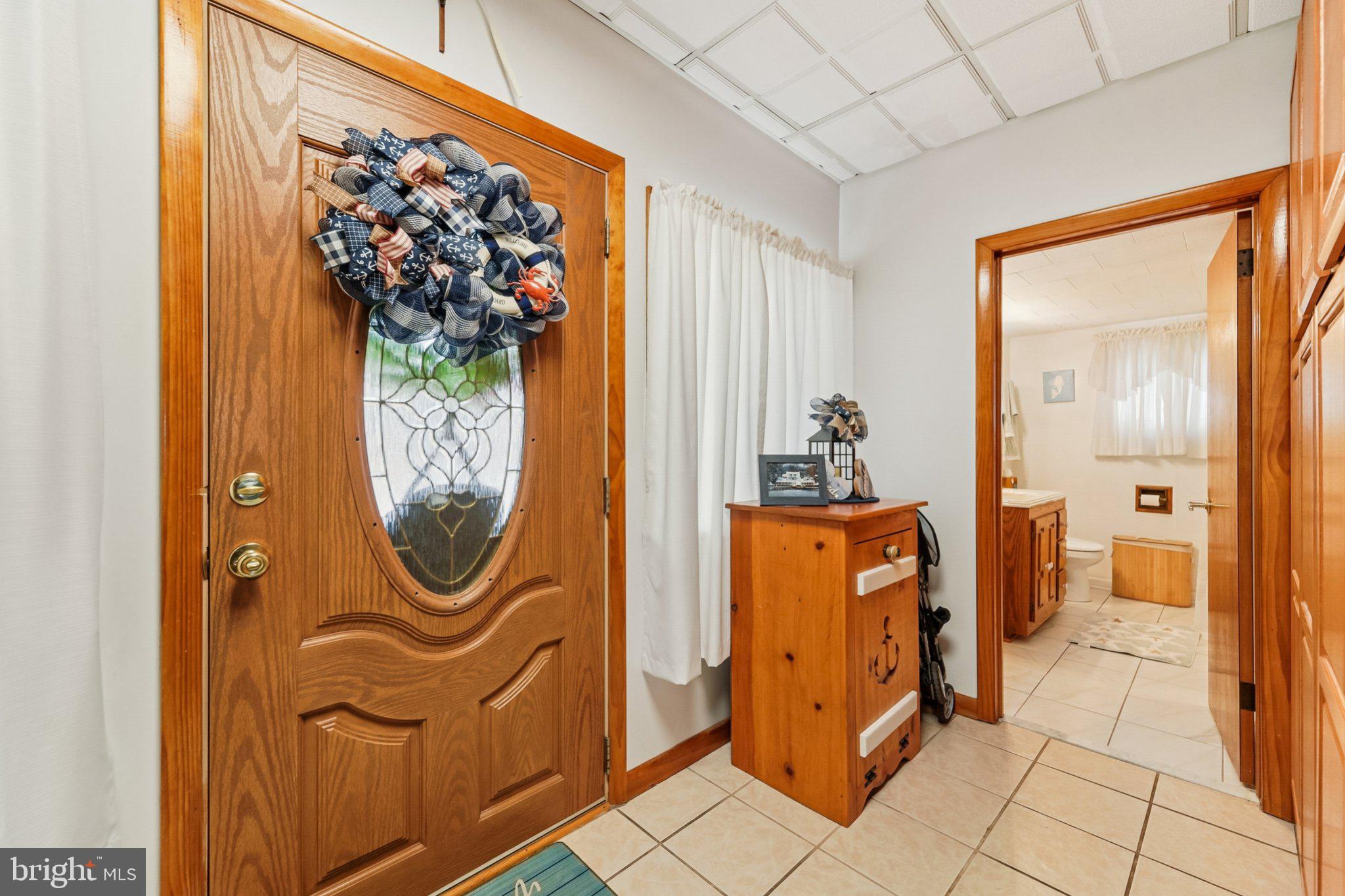 1507 Shore Road Baltimore, MD 21220 - Photo 24 of 46 a view of a entryway door with wooden floor