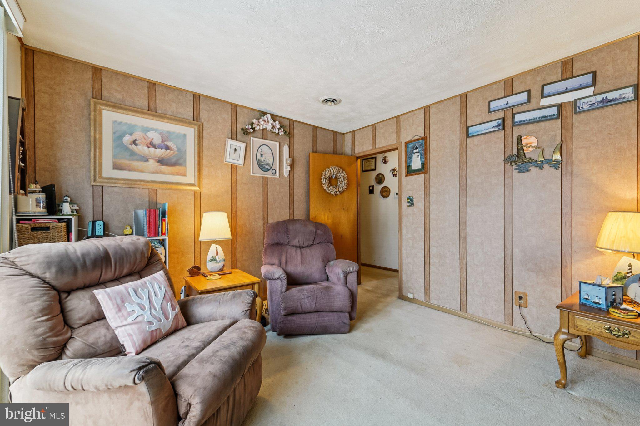 1507 Shore Road Baltimore, MD 21220 - Photo 26 of 46 a living room with furniture and a large window