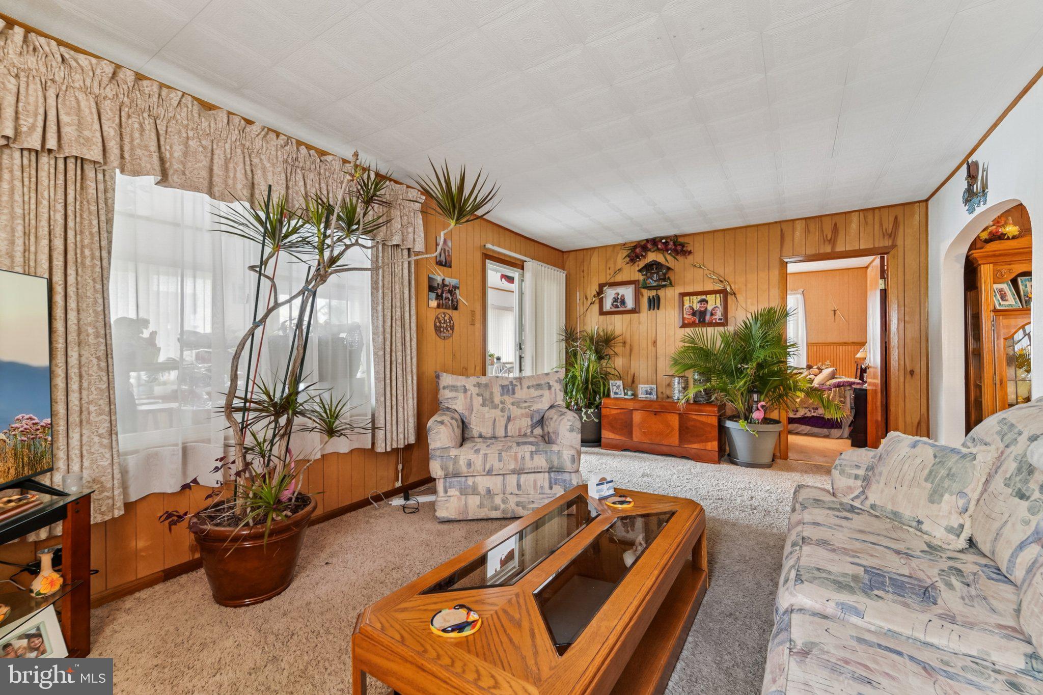 1507 Shore Road Baltimore, MD 21220 - Photo 43 of 46 a living room with furniture and a large window