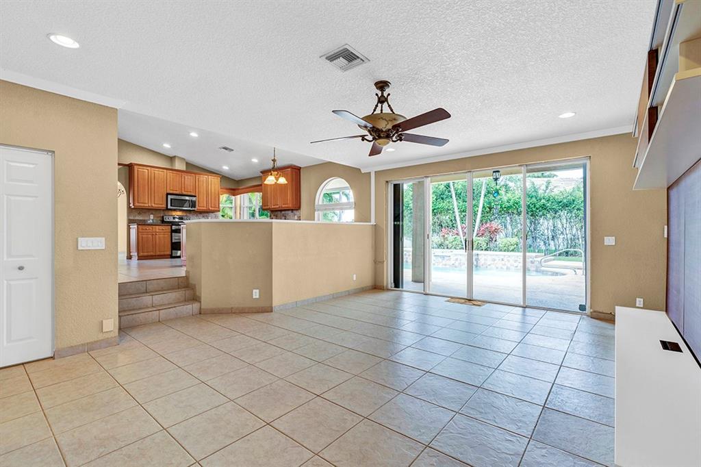 19571 Black Olive Lane Boca Raton, FL 33498 - Photo 14 of 61 a view of a kitchen with furniture and windows