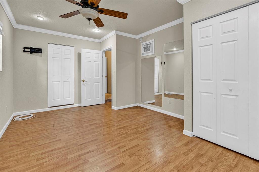 19571 Black Olive Lane Boca Raton, FL 33498 - Photo 19 of 61 wooden floor in an empty room with a window