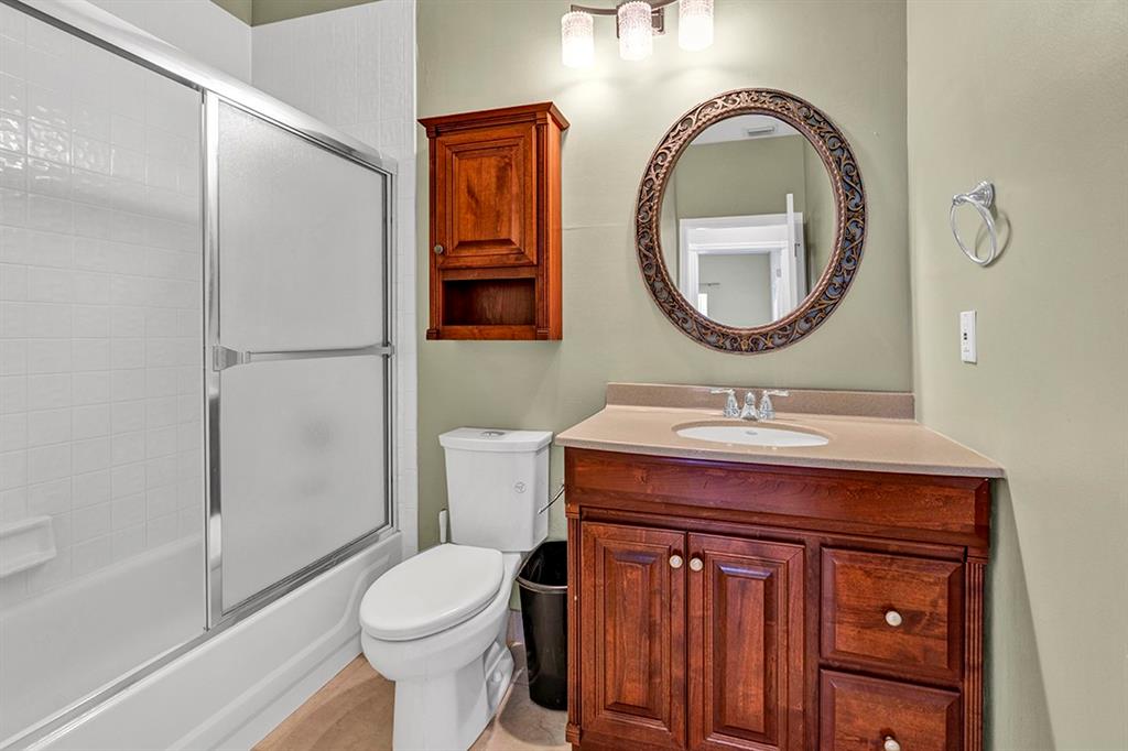 19571 Black Olive Lane Boca Raton, FL 33498 - Photo 21 of 61 a bathroom with a toilet a sink and a shower