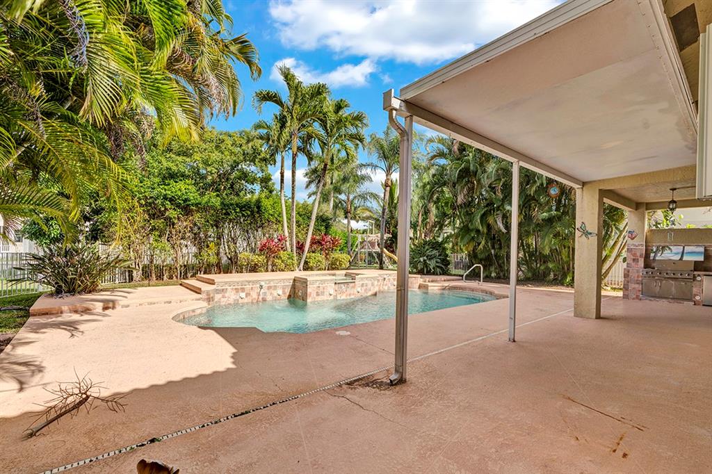 19571 Black Olive Lane Boca Raton, FL 33498 - Photo 5 of 61 a view of a backyard patio and swimming pool