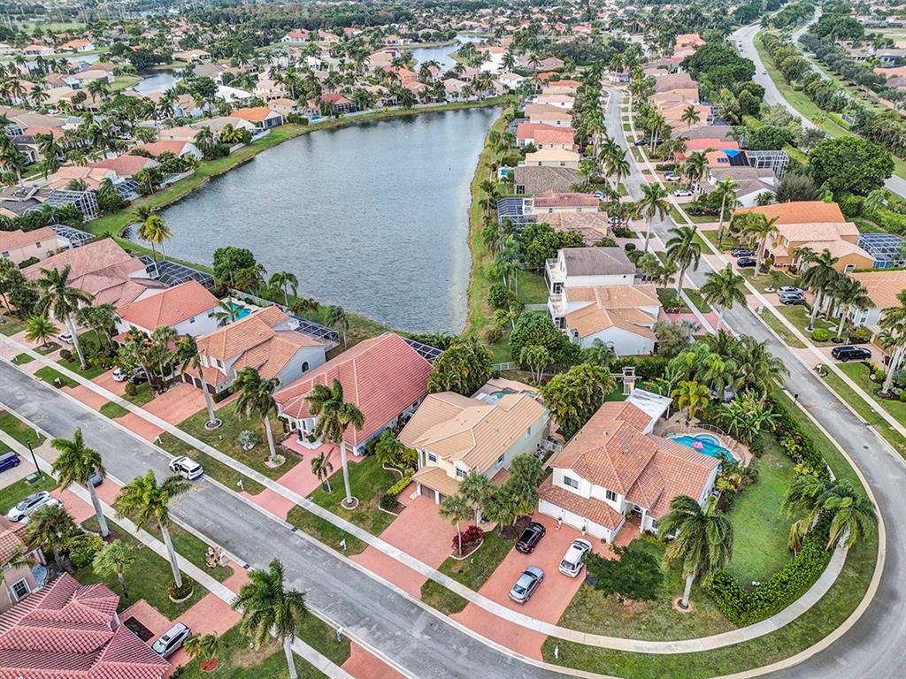 19571 Black Olive Lane Boca Raton, FL 33498 - Photo 52 of 61 an aerial view of residential houses with outdoor space