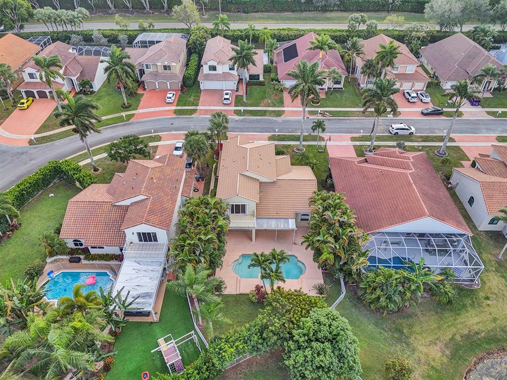 19571 Black Olive Lane Boca Raton, FL 33498 - Photo 54 of 61 an aerial view of house with yard swimming pool and outdoor seating