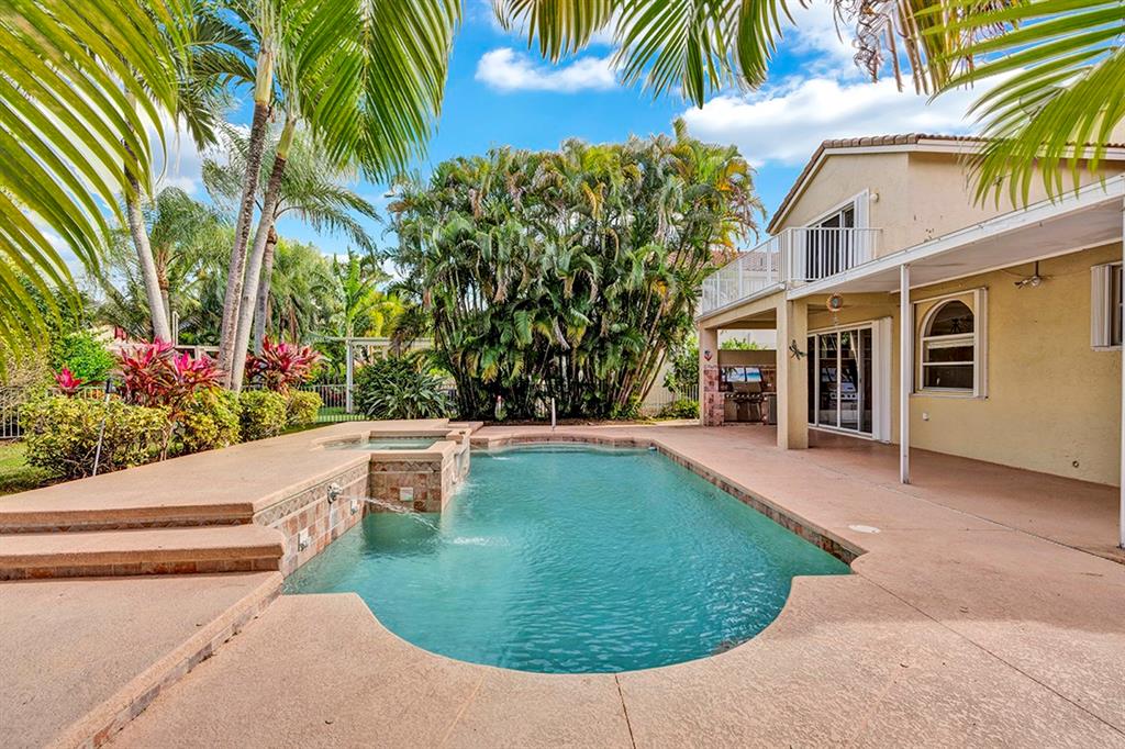 19571 Black Olive Lane Boca Raton, FL 33498 - Photo 56 of 61 a view of a house with a backyard
