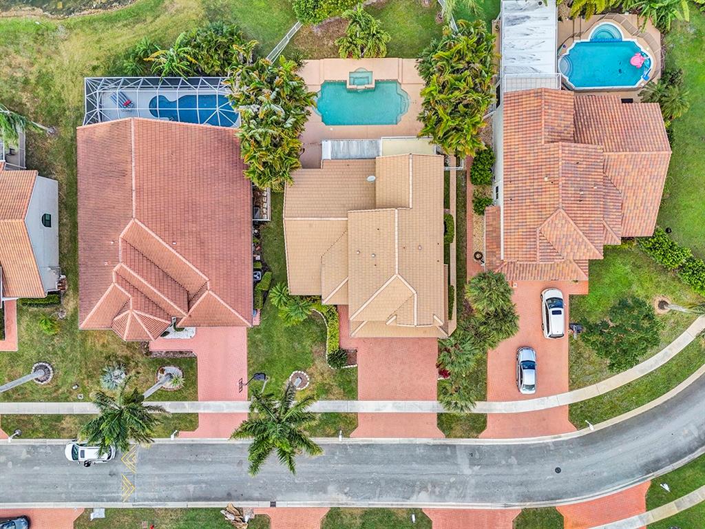 19571 Black Olive Lane Boca Raton, FL 33498 - Photo 58 of 61 an aerial view of a house with yard swimming pool and outdoor seating