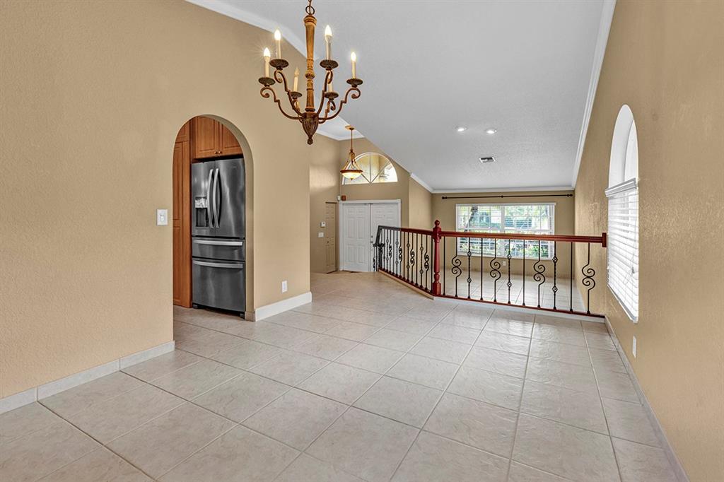 19571 Black Olive Lane Boca Raton, FL 33498 - Photo 7 of 61 a view of an entryway with a livingroom