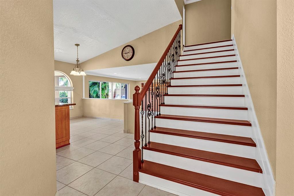 19571 Black Olive Lane Boca Raton, FL 33498 - Photo 9 of 61 a view of entryway and hall