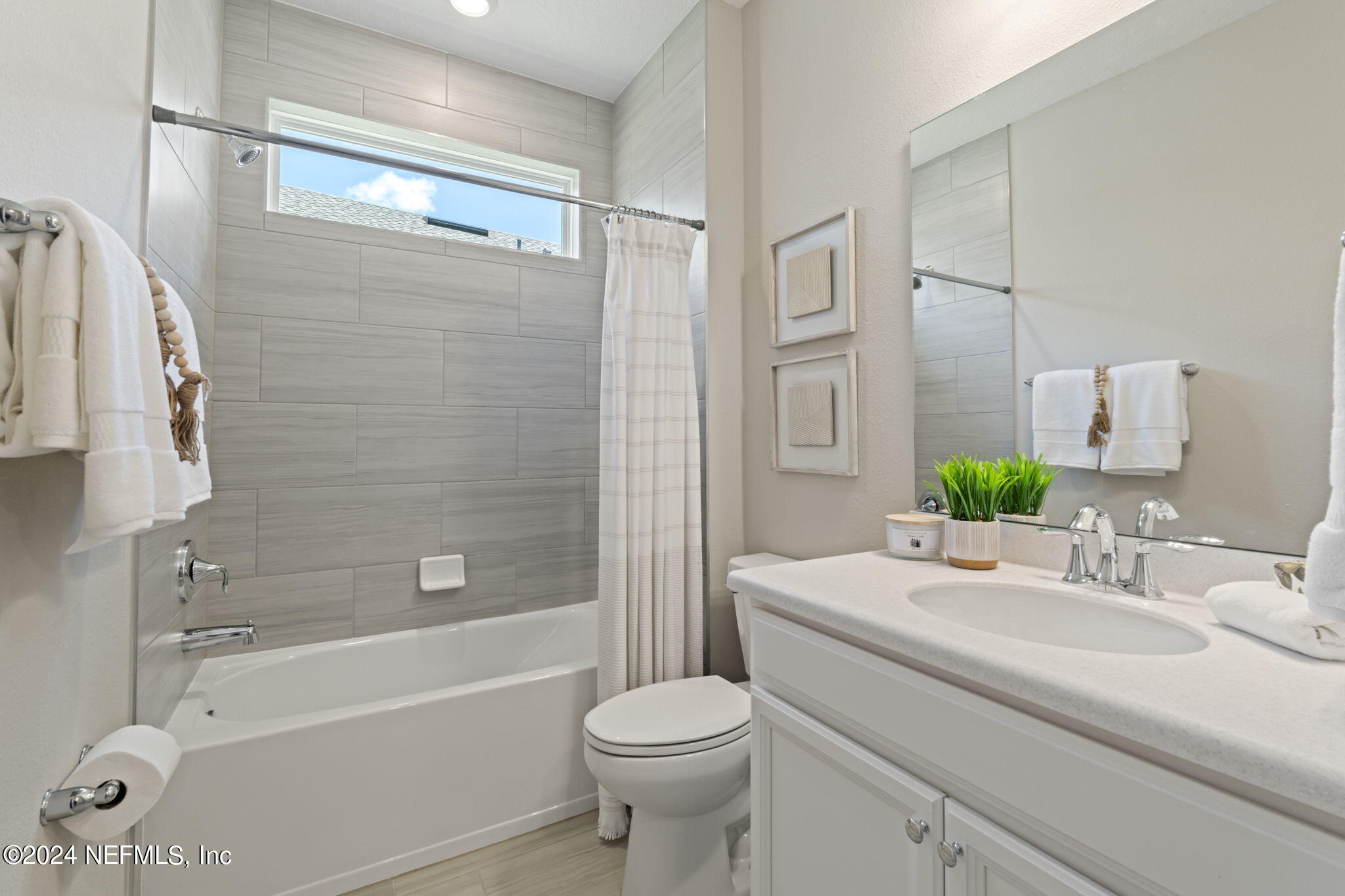 375 Latrobe Avenue St. Augustine, FL 32095 - Photo 39 of 83 a bathroom with a sink toilet and shower