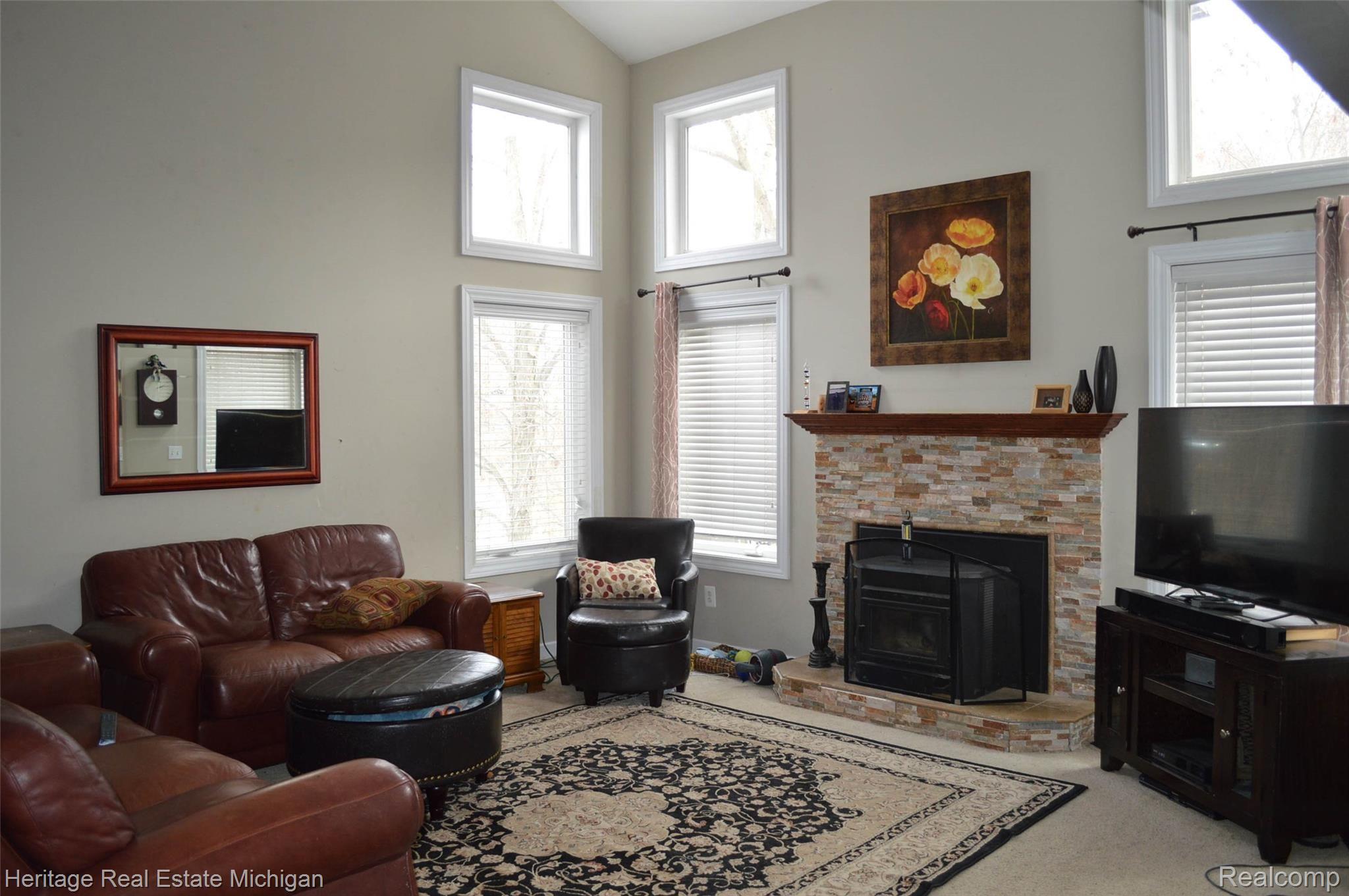 4126 Stamper Way Howell, MI 48855 - Photo 3 of 12 Spacious Great Room with pellet insert!