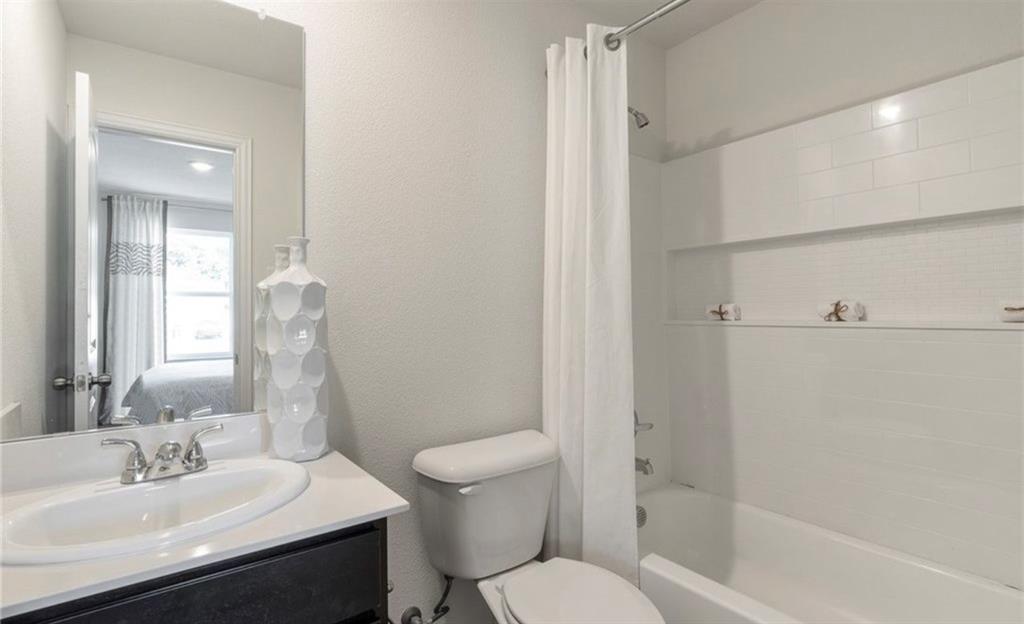 812 South 22nd Street Temple, TX 76501 - Photo 19 of 34 a bathroom with a sink toilet and shower
