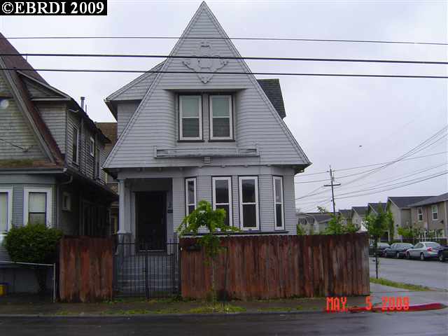 a front view of a house with garage