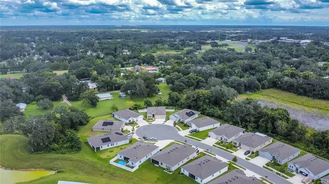 an aerial view of house with outdoor space