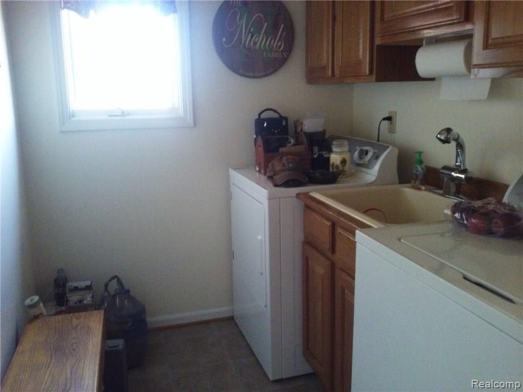 4660 Capac Road Capac, MI 48014 - Photo 21 of 65 This is another view of the laundry room.