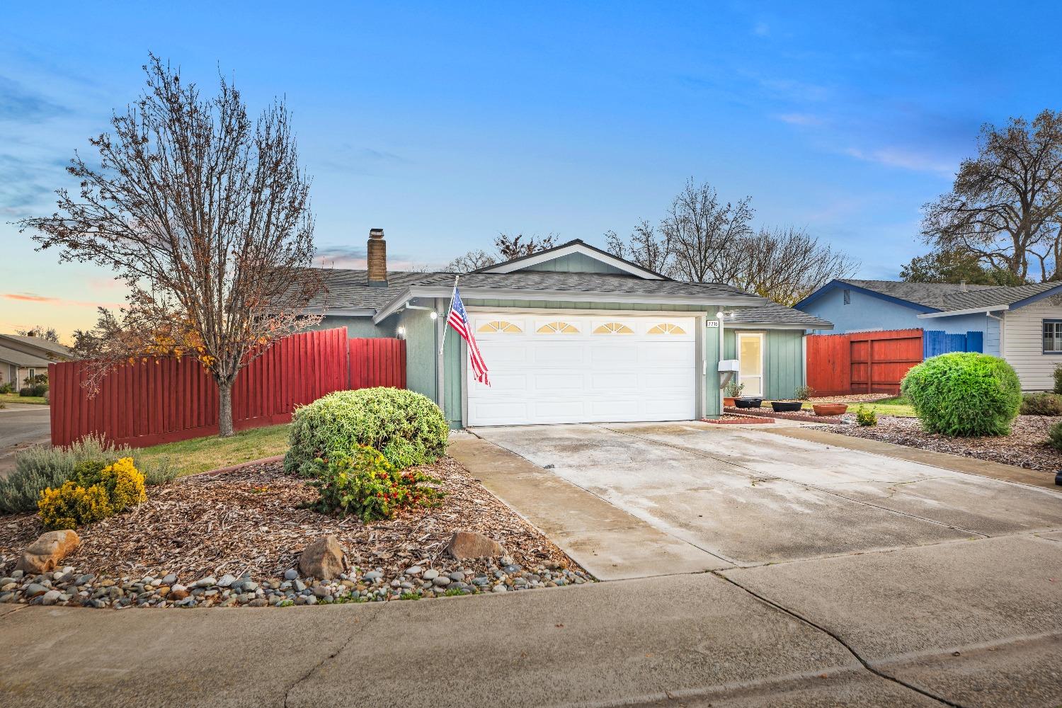 7716 Commonwealth Drive Antelope, CA 95843 - Photo 1 of 1 a front view of a house with garden