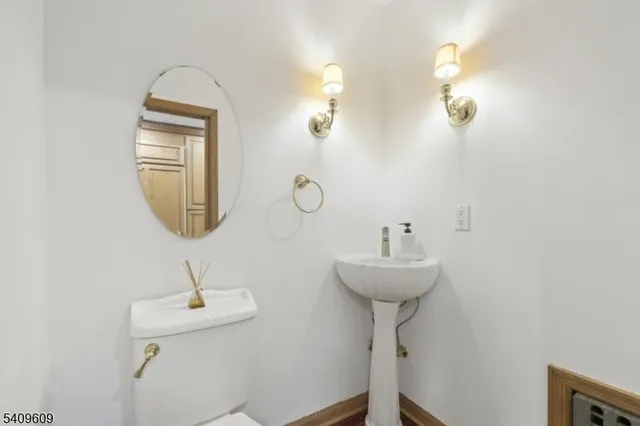 a bathroom with a sink and mirror
