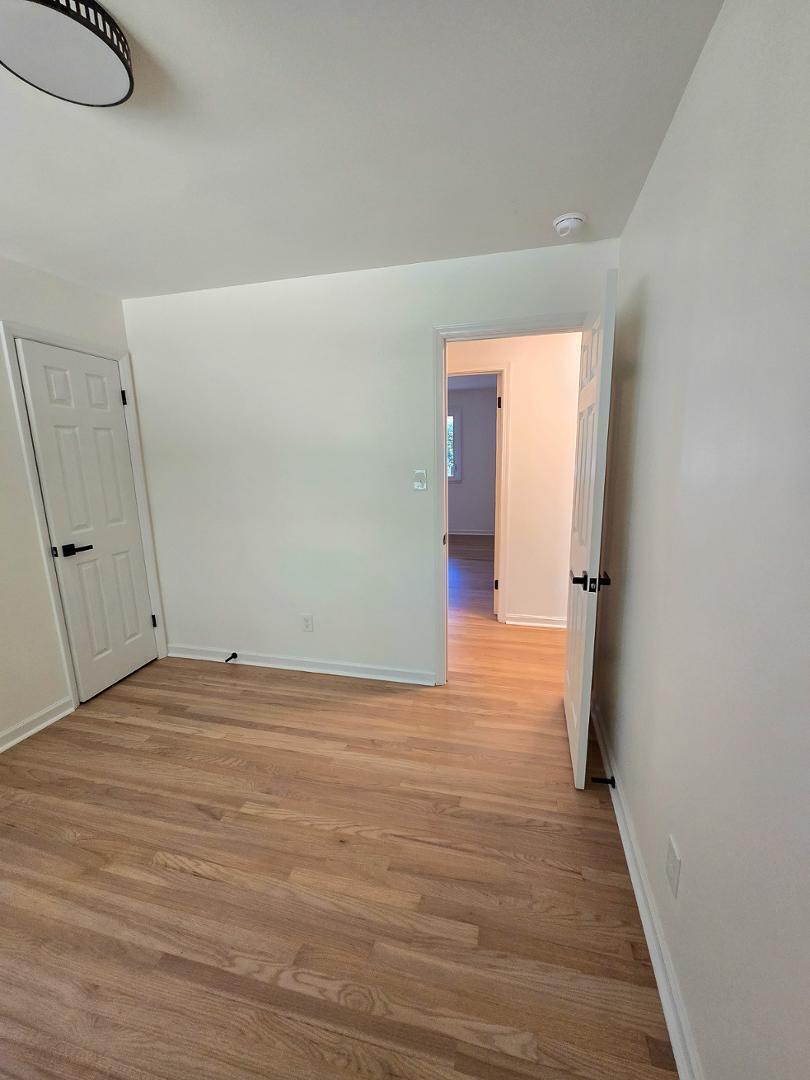 1105 Hardimont Road Raleigh, NC 27609 - Photo 30 of 61 a view of a room with wooden floor