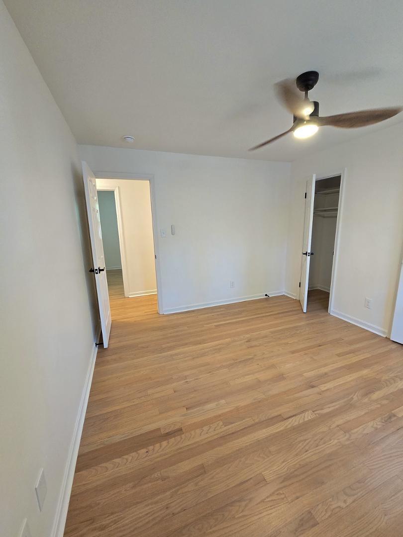 1105 Hardimont Road Raleigh, NC 27609 - Photo 33 of 61 a view of empty room with wooden floor