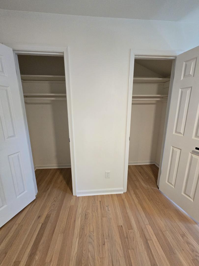 1105 Hardimont Road Raleigh, NC 27609 - Photo 35 of 61 an empty room with wooden floor and closet