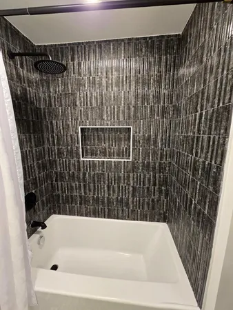 a view of a kitchen with a sink and dishwasher wooden floor