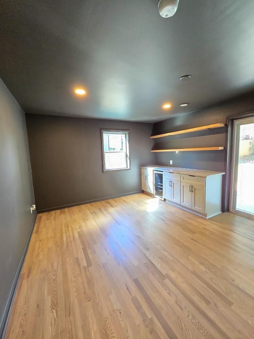 1105 Hardimont Road Raleigh, NC 27609 - Photo 41 of 61 a view of empty room with wooden floor and fan