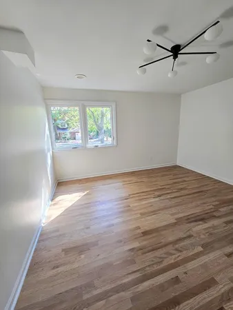 a view of an empty room and window