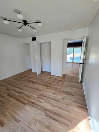 a view of a sink and a cabinets in a room