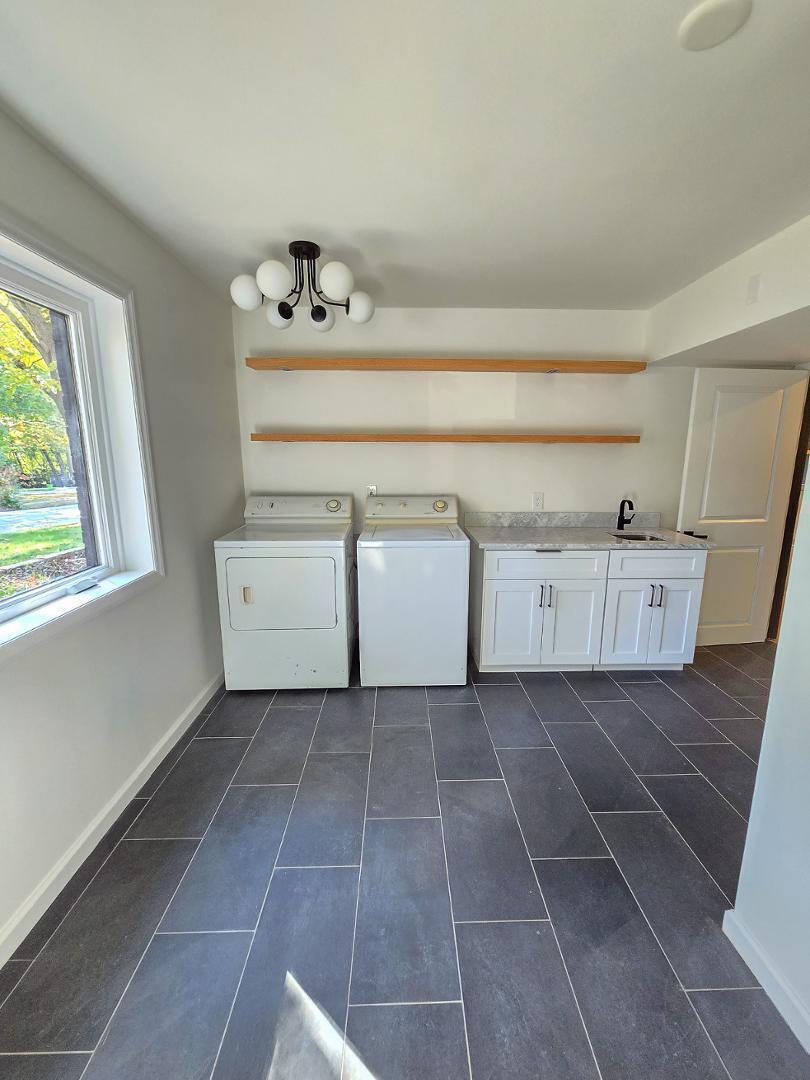 1105 Hardimont Road Raleigh, NC 27609 - Photo 53 of 61 a view of a sink and a cabinets in a room