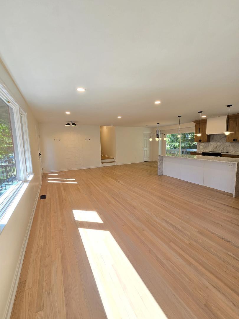 1105 Hardimont Road Raleigh, NC 27609 - Photo 7 of 61 a view of a hall way with kitchen