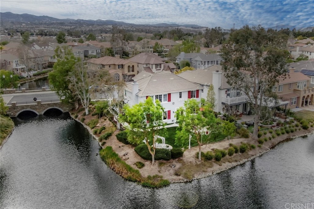 an aerial view of a house with a garden and plants