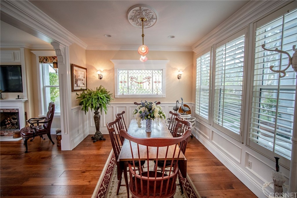 27016 Island Road Valencia, CA 91355 - Photo 13 of 53 a view of a dining room with furniture window and wooden floor