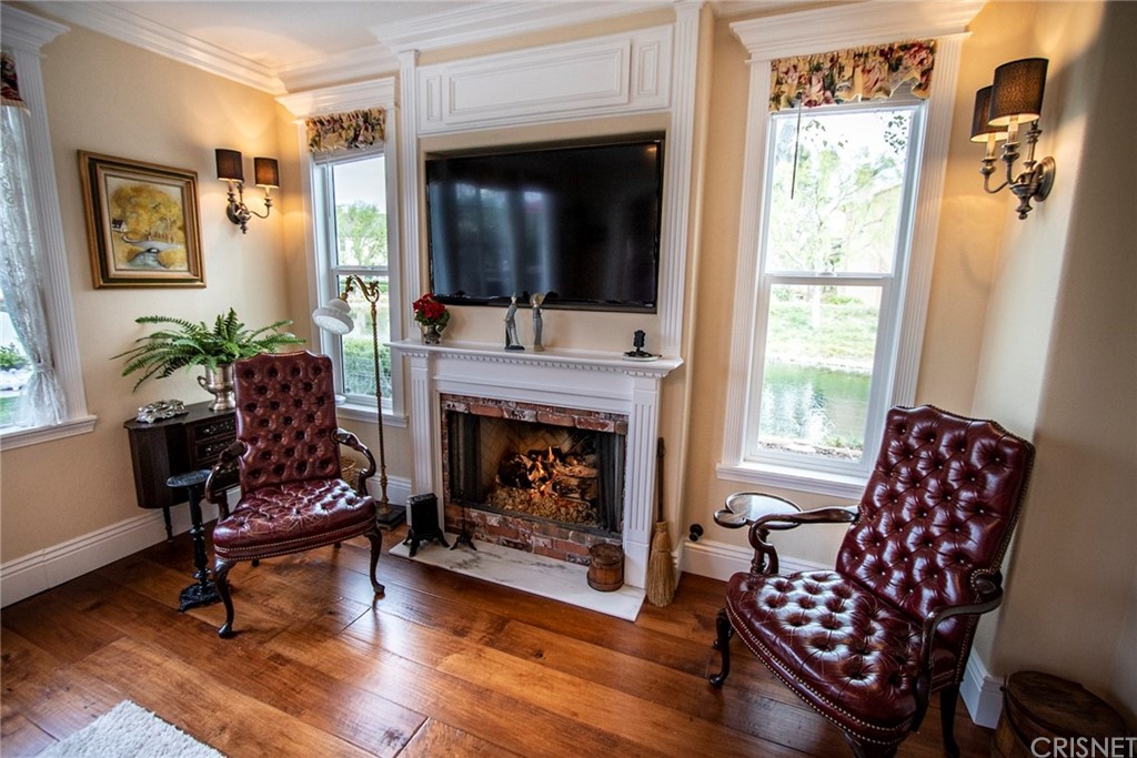 27016 Island Road Valencia, CA 91355 - Photo 17 of 53 a living room with furniture and a fireplace