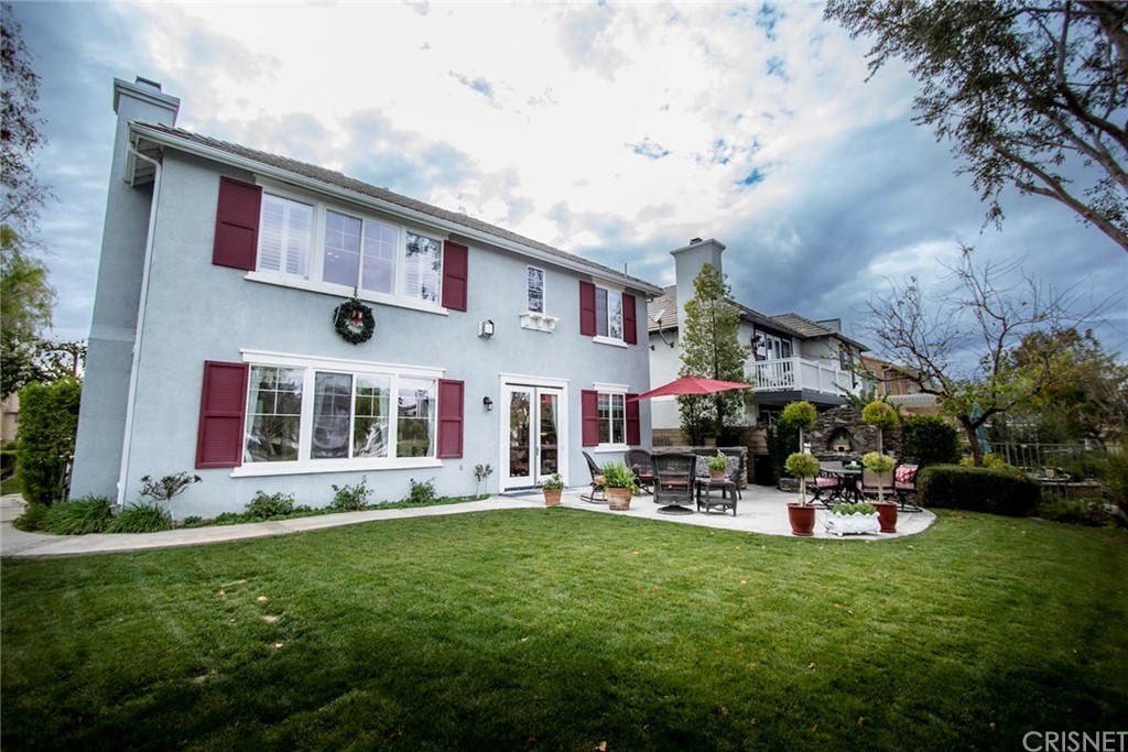 27016 Island Road Valencia, CA 91355 - Photo 25 of 53 a front view of building with yard