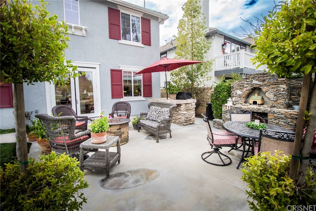 27016 Island Road Valencia, CA 91355 - Photo 27 of 53 a view of a patio with sitting area
