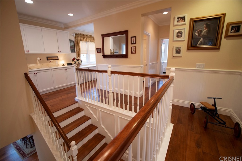 27016 Island Road Valencia, CA 91355 - Photo 36 of 53 a view of a kitchen with furniture and wooden floor