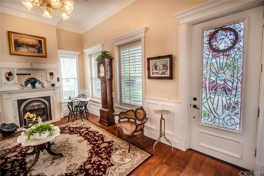 27016 Island Road Valencia, CA 91355 - Photo 7 of 53 a living room with furniture and a fireplace