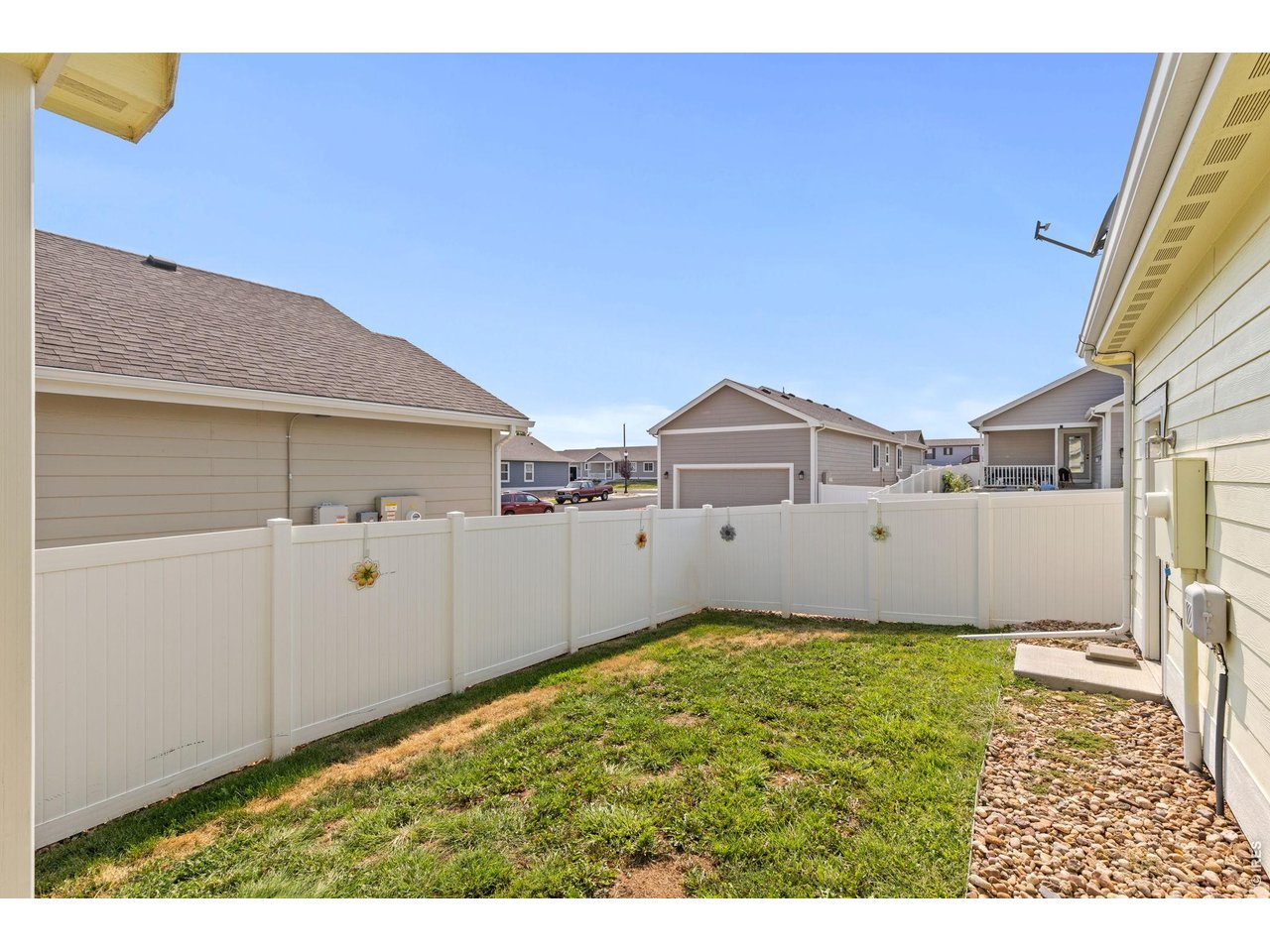 4231 Sunflower Road Evans, CO 80620 - Photo 27 of 29 Fully fenced backyard with access to Garage