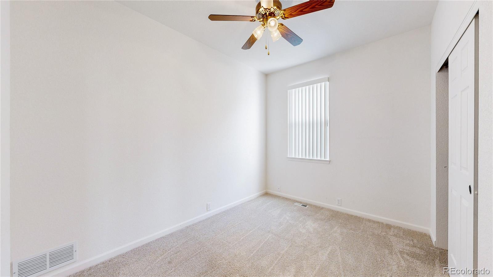 12237 Cook Court Thornton, CO 80241 - Photo 25 of 48 a view of room with a window