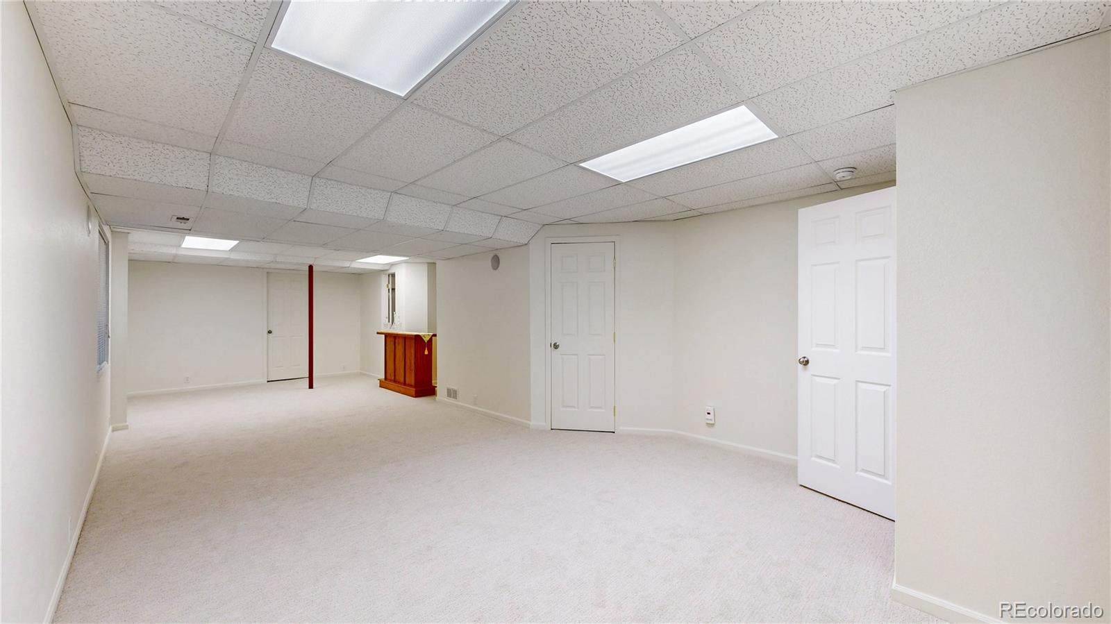 12237 Cook Court Thornton, CO 80241 - Photo 30 of 48 an empty room with natural light