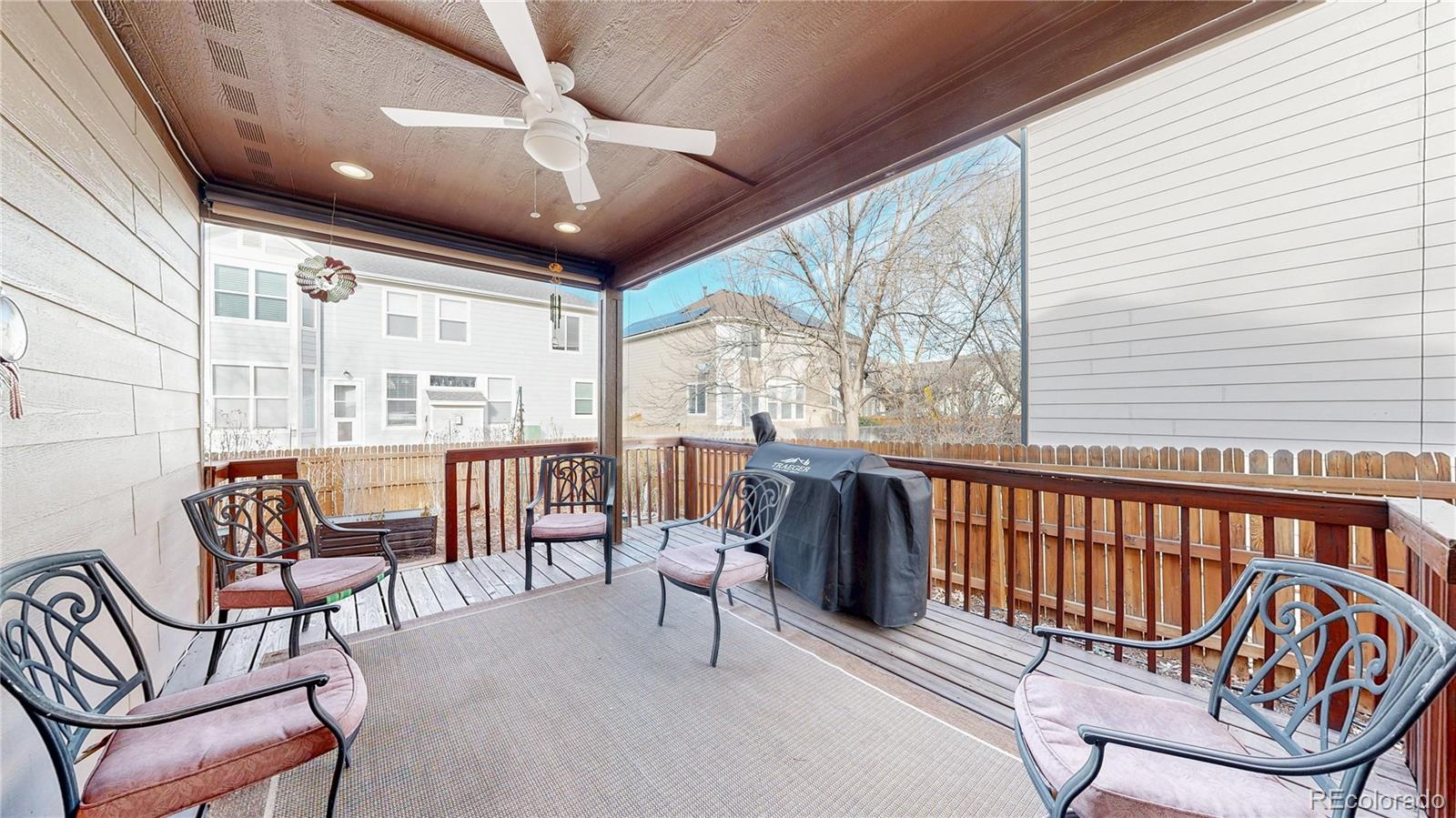 12237 Cook Court Thornton, CO 80241 - Photo 36 of 48 a view of a chairs and table in the balcony
