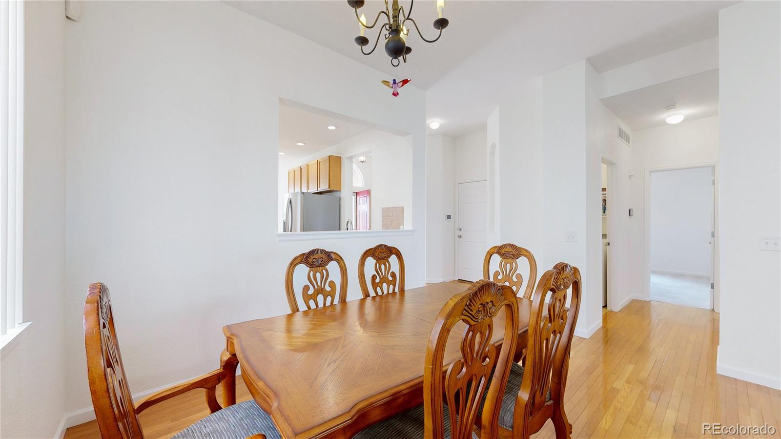 12237 Cook Court Thornton, CO 80241 - Photo 7 of 48 a view of a dining room with furniture