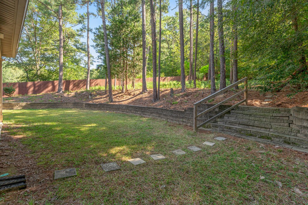 10230 Whitesville Road Fortson, GA 31808 - Photo 48 of 53 Level yard area off patio