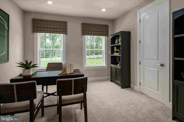 a view of a workspace with a window and dining table chair
